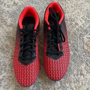 Under armor boys soccer cleats in black and neon colors